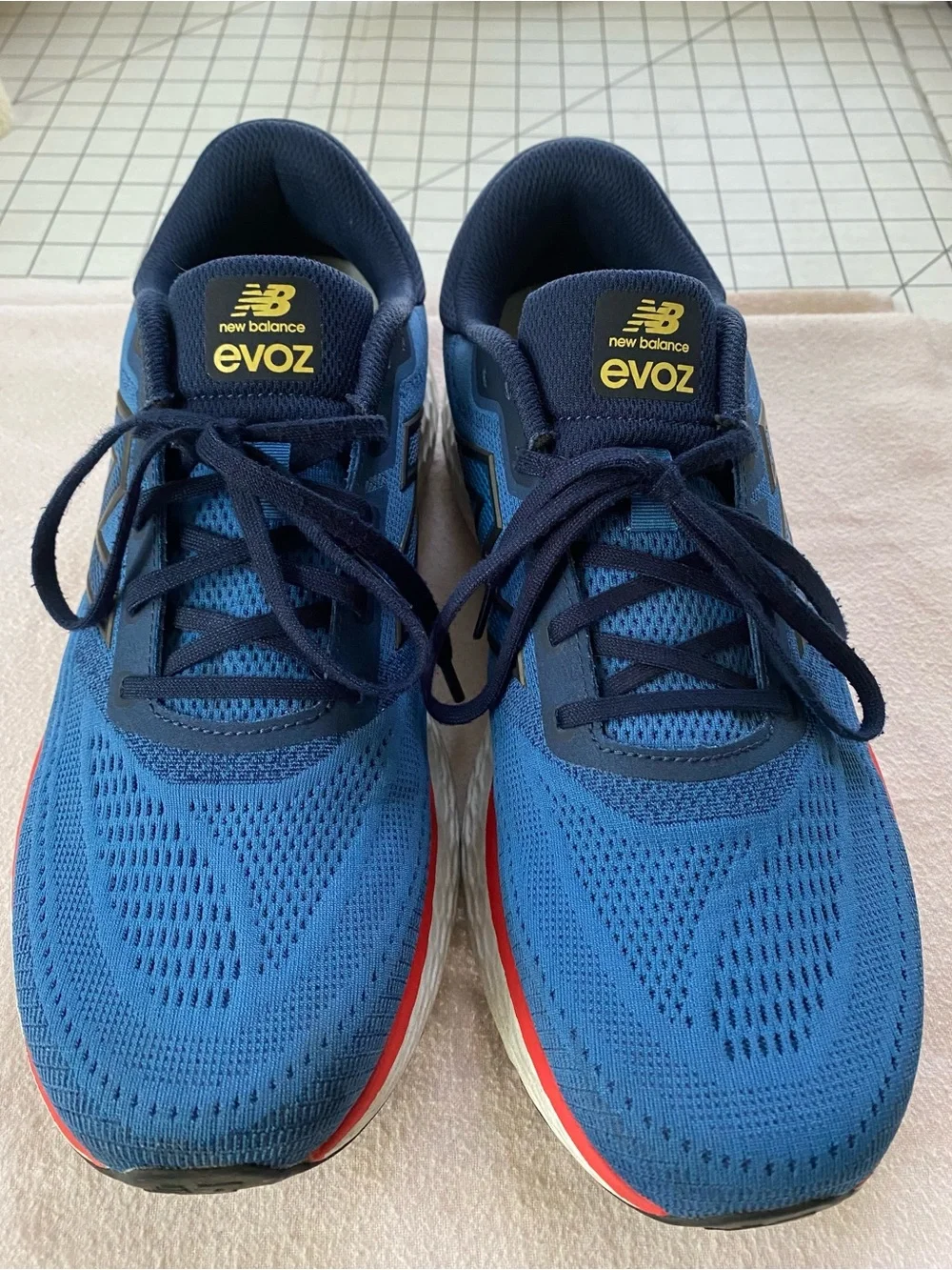 New Balance EvoZ Men's Blue and Navy Athletic Running Shoes with Red Accent